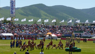 During Naadam Mongolian wrestlers posing for the match, by Orgio89